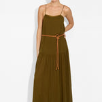 Model wearing the Maya Belt in Nugget over the olive Livia Maxi Dress